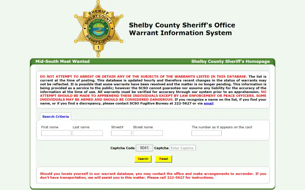 A screenshot of the Shelby County Sheriff's Office website featuring a warrant information system that allows public access to search for individuals with active warrants, cautioning users not to attempt arrests and providing contact details for further assistance.